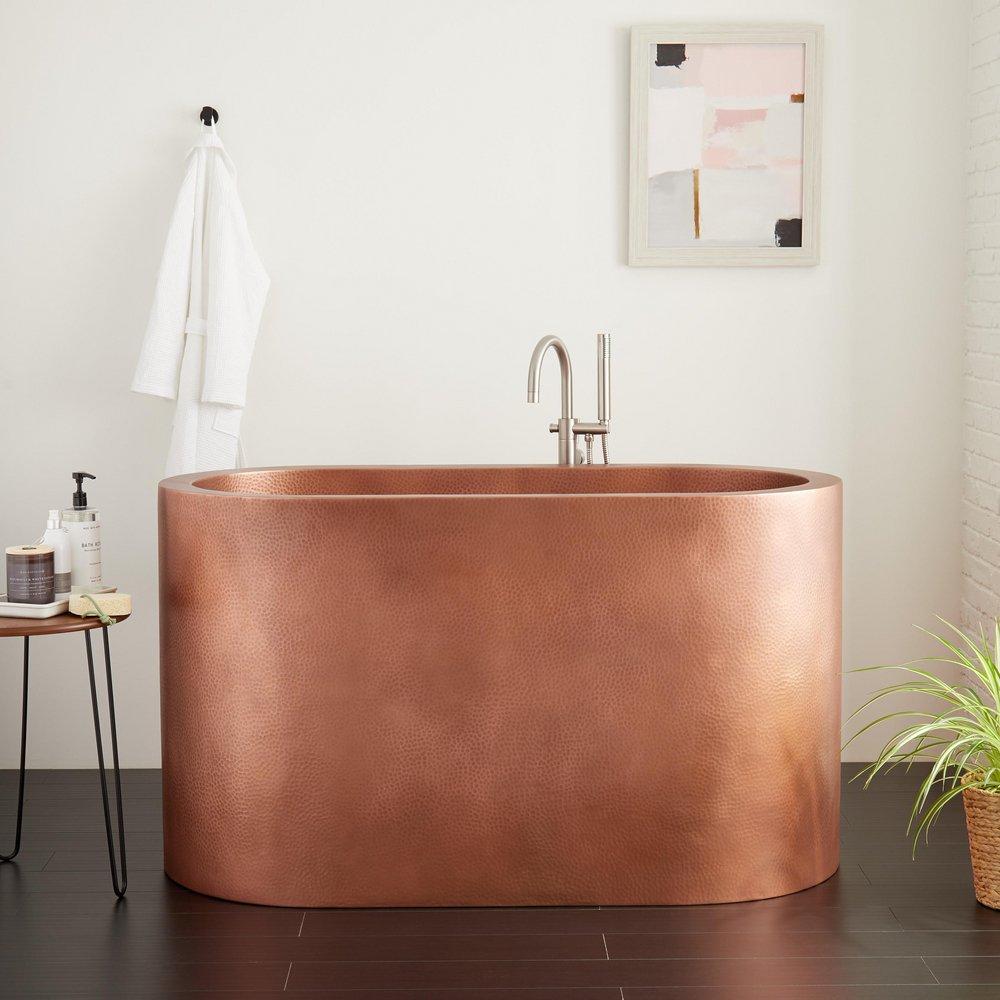 Signature Hardware Raksha 60 in. Freestanding Bathtub with Center Drain in Antique Copper Patina