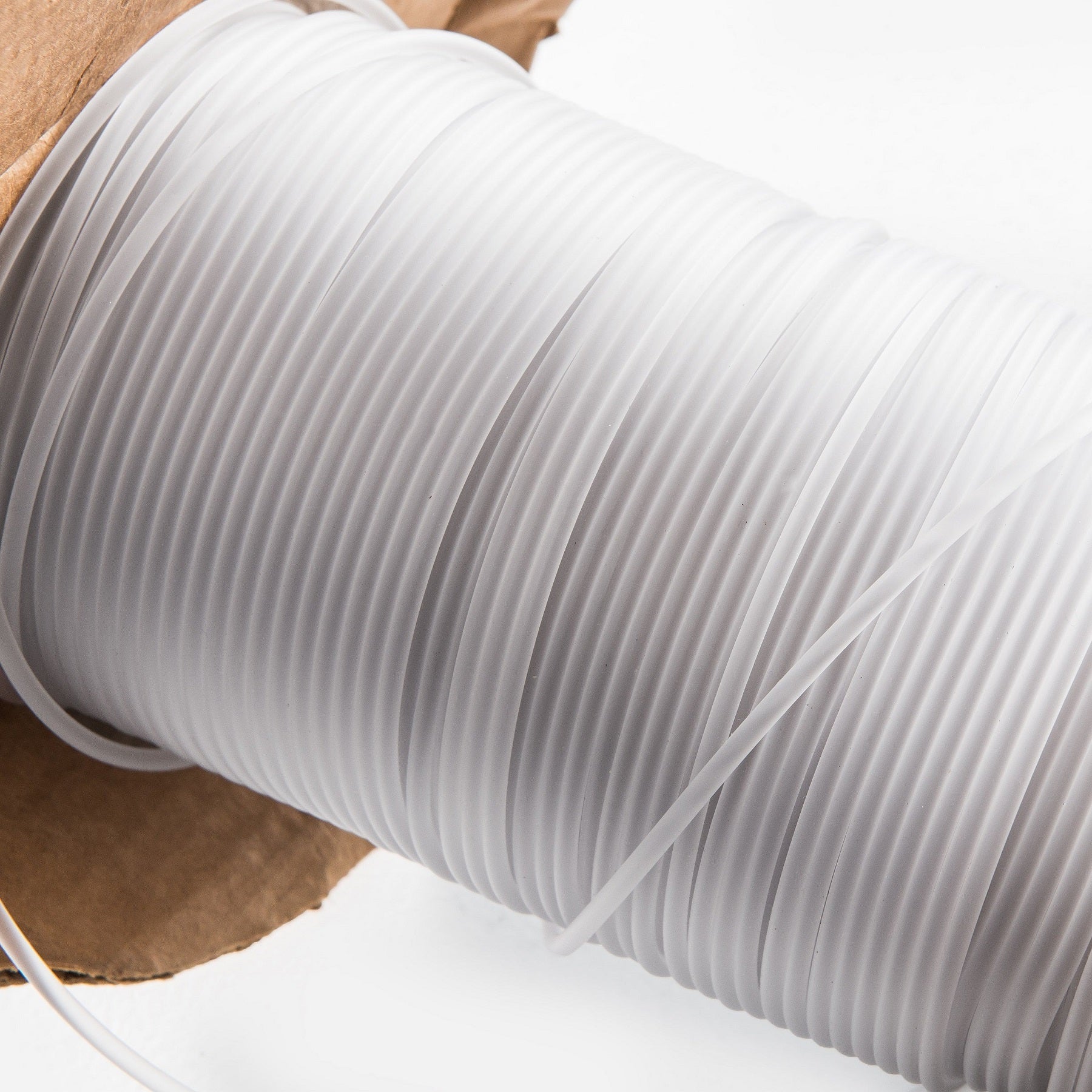 White welding rod on spool